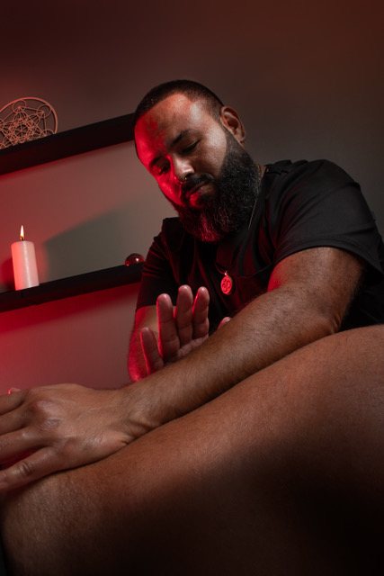 Carlos Blanco applying acupressure
